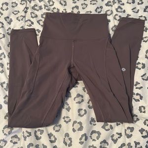 LULULEMON winder train leggings. 25 in WITH POCKETS. color green.